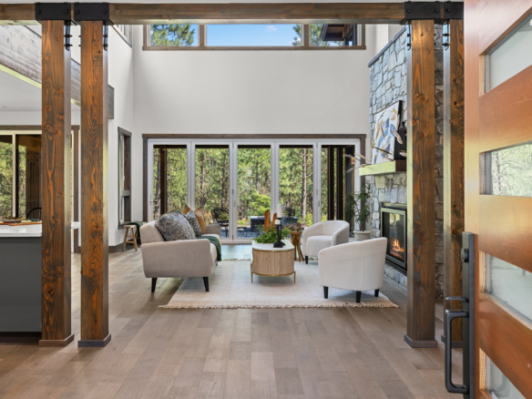 entry to door into a mountain home living room with mountain views