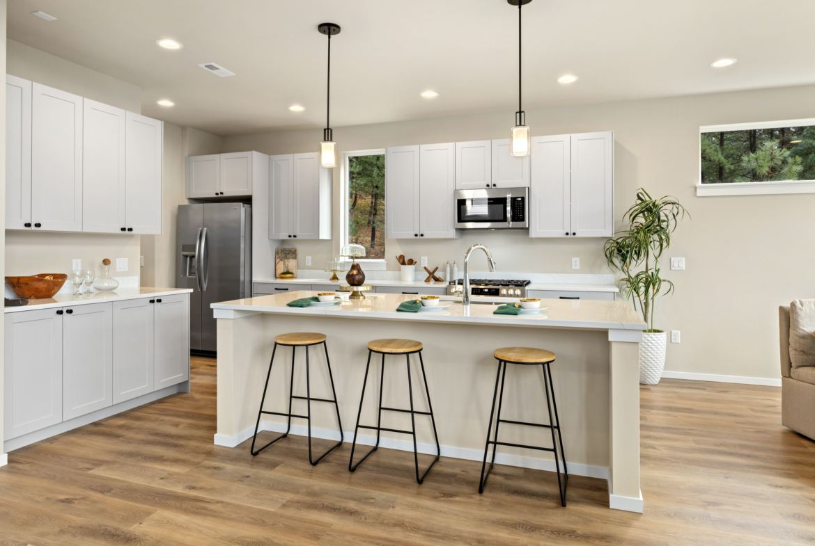 The upgraded kitchen package with a fridge in Ederra 6