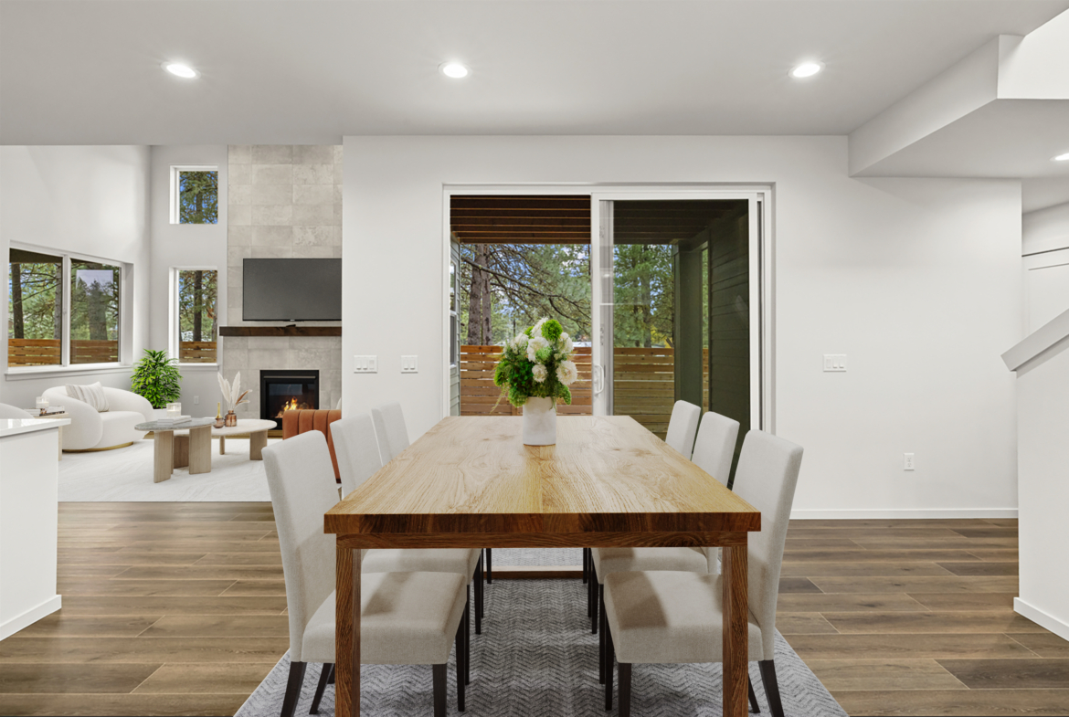 Tronsen by Trailside Homes in Ederra dining room that leads to the outdoor covered patio with view of the forest in Cle Elum