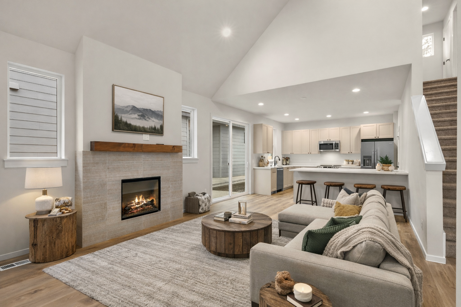 Peoh Point Ederra homesite 22 living room and kitchen open concept virtually staged with furniture