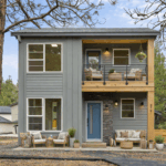 The Cooper at Ederra homesite 23 in Cle Elum by Trailside Homes virtually staged with covered patio and covered deck outdoor seating