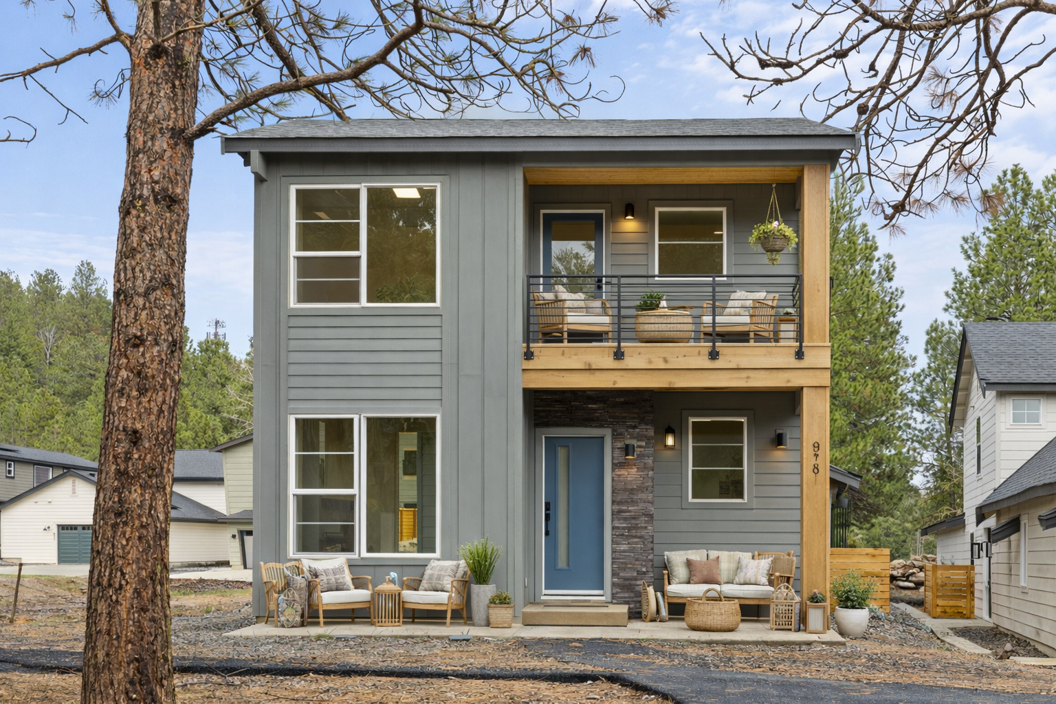 The Cooper at Ederra homesite 23 in Cle Elum by Trailside Homes virtually staged with covered patio and covered deck outdoor seating