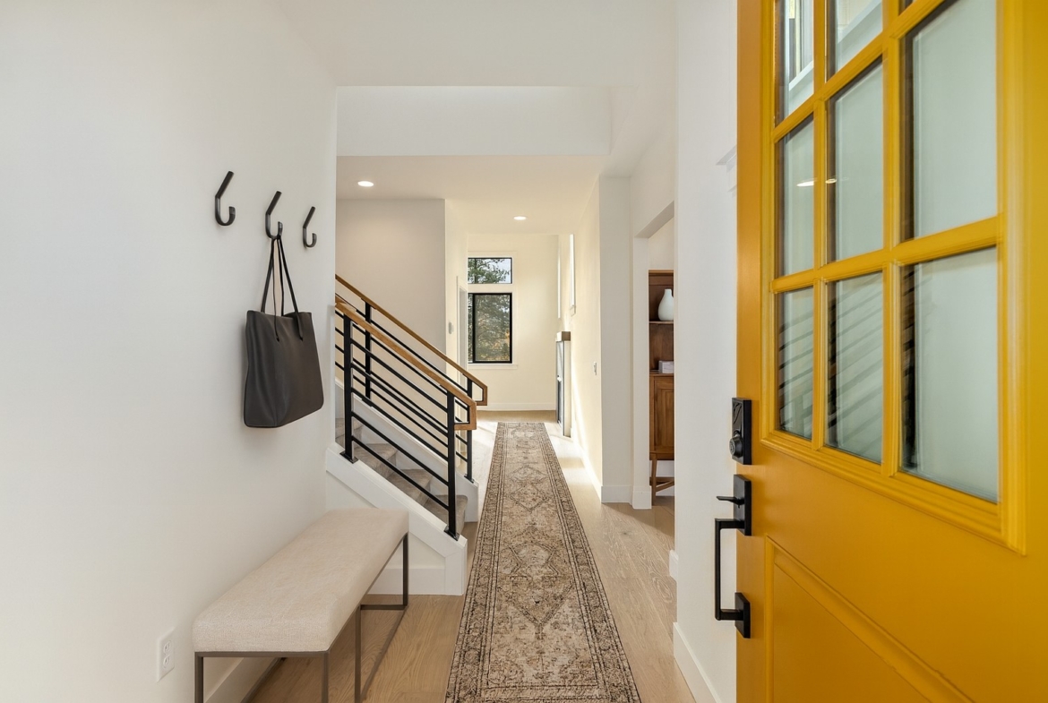 The Naches Ederra 7 Entry Way virtual staging with yellow entry door