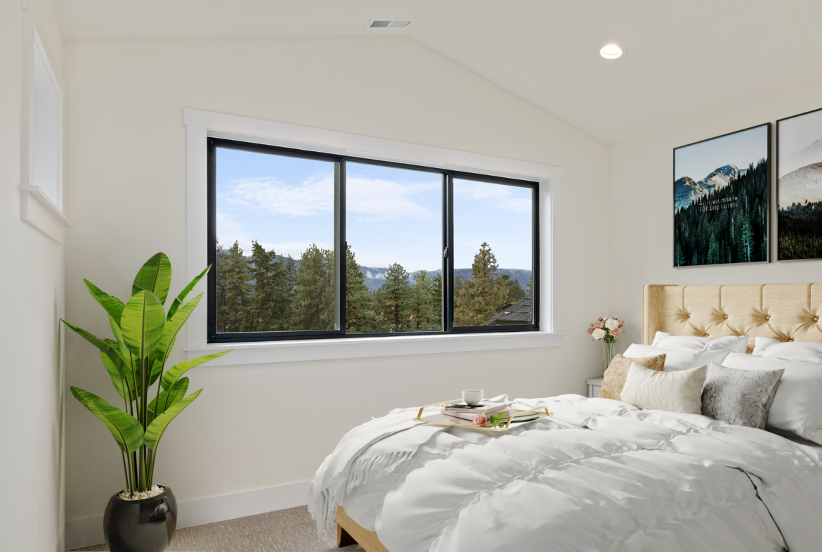 The Naches Ederra 7 master bedroom with views of the mountains and trees